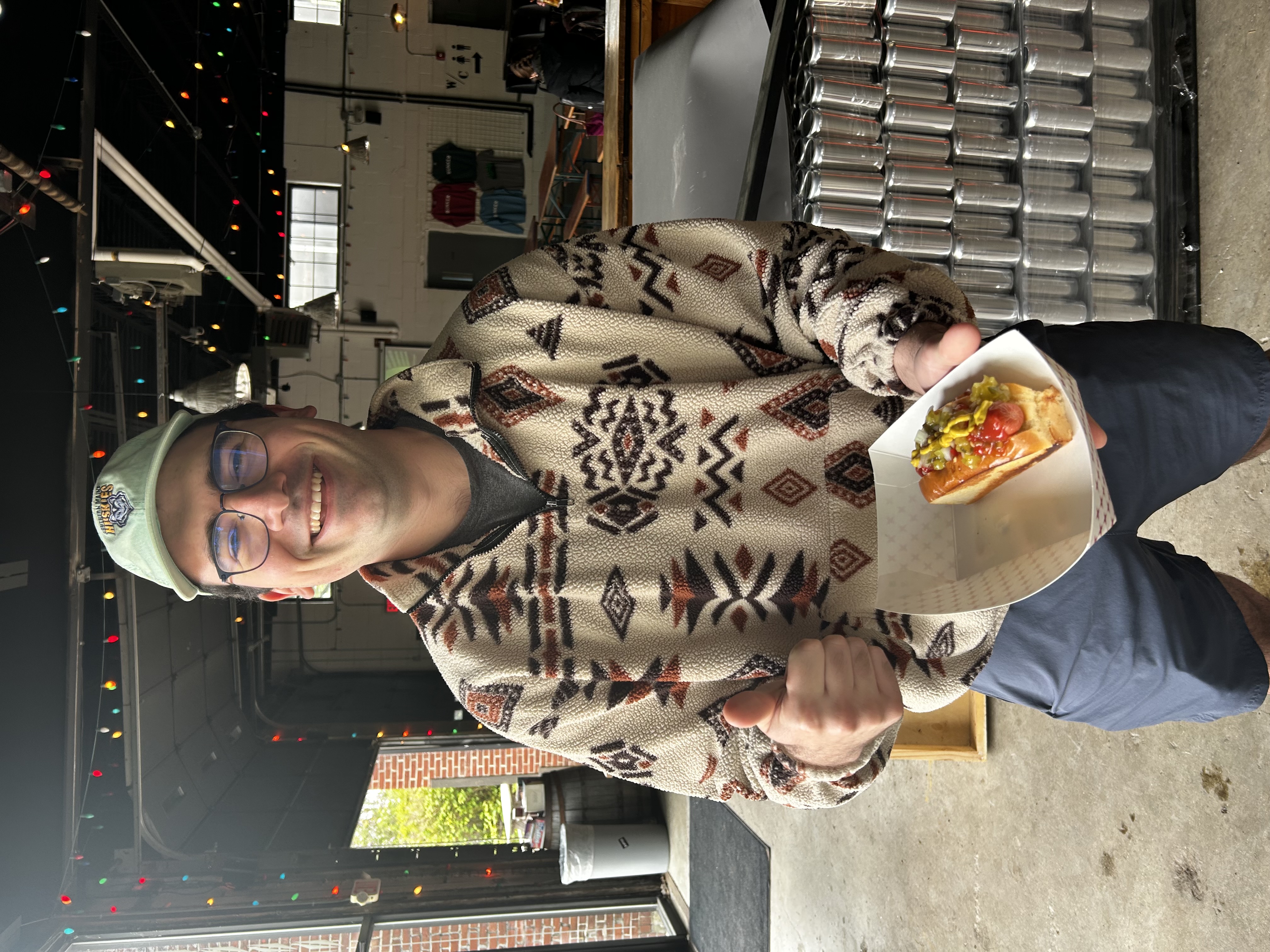 Brandon with a hot dog